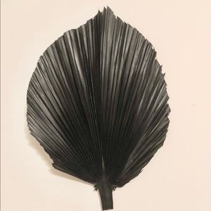 Dried shaped and painted organic palm leaf